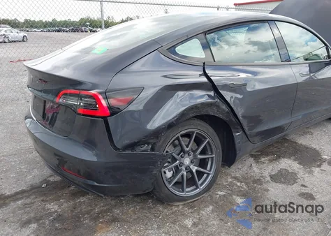 2021 Tesla Model 3 Standard Range Plus Rear-Wheel Drive from USA, damaged, VIN 5YJ3E1EA3MF058374